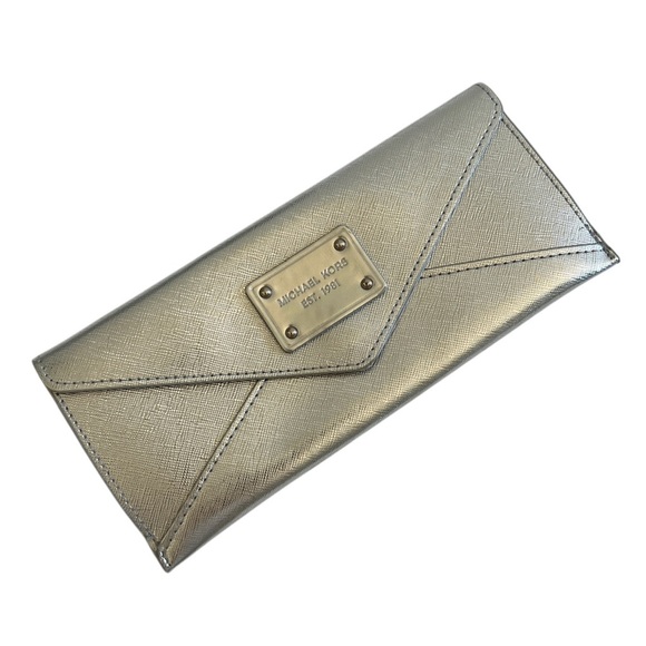 Michael Kors Handbags - Michael Kors Silver wallet pouch